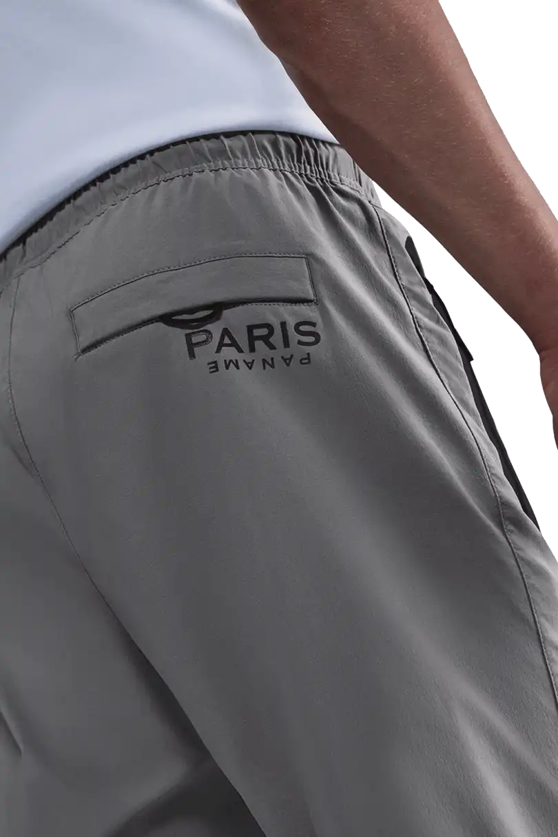 Pánské tkané fotbalové kalhoty Nike PSG 25/26 Tech šedé