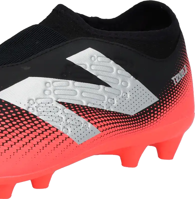 Dětské lisovky New Balance Tekela V4+ Magique FG oranžovo-černé