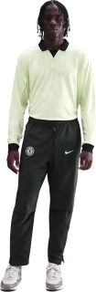 Pánské tkané fotbalové kalhoty Nike Chelsea FC 25/26 Tech zelené