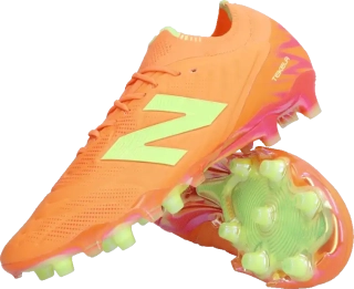 Pánské kopačky lisovky New Balance Tekela V5 Elite Low FG oranžové